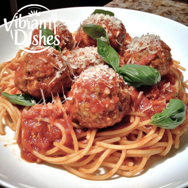 Large Italian meatballs served with spaghetti and marinara sauce